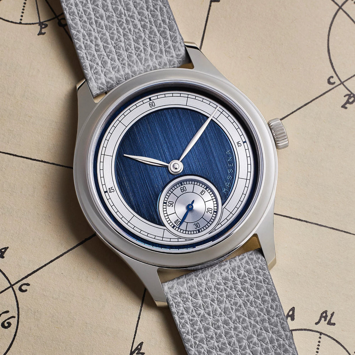 Massena LAB Noctograph with brushed blue dial, rhodium chapter ring and grey strap, front view