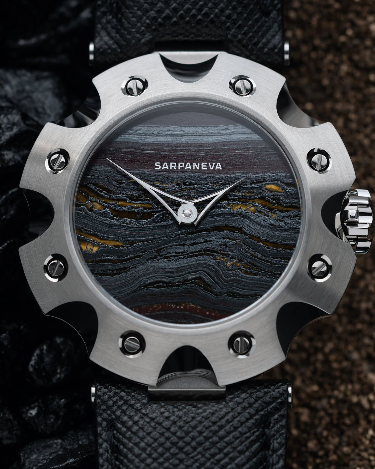 Sarpaneva Supernova with tiger iron stone dial and turbine-shaped steel case, close front view