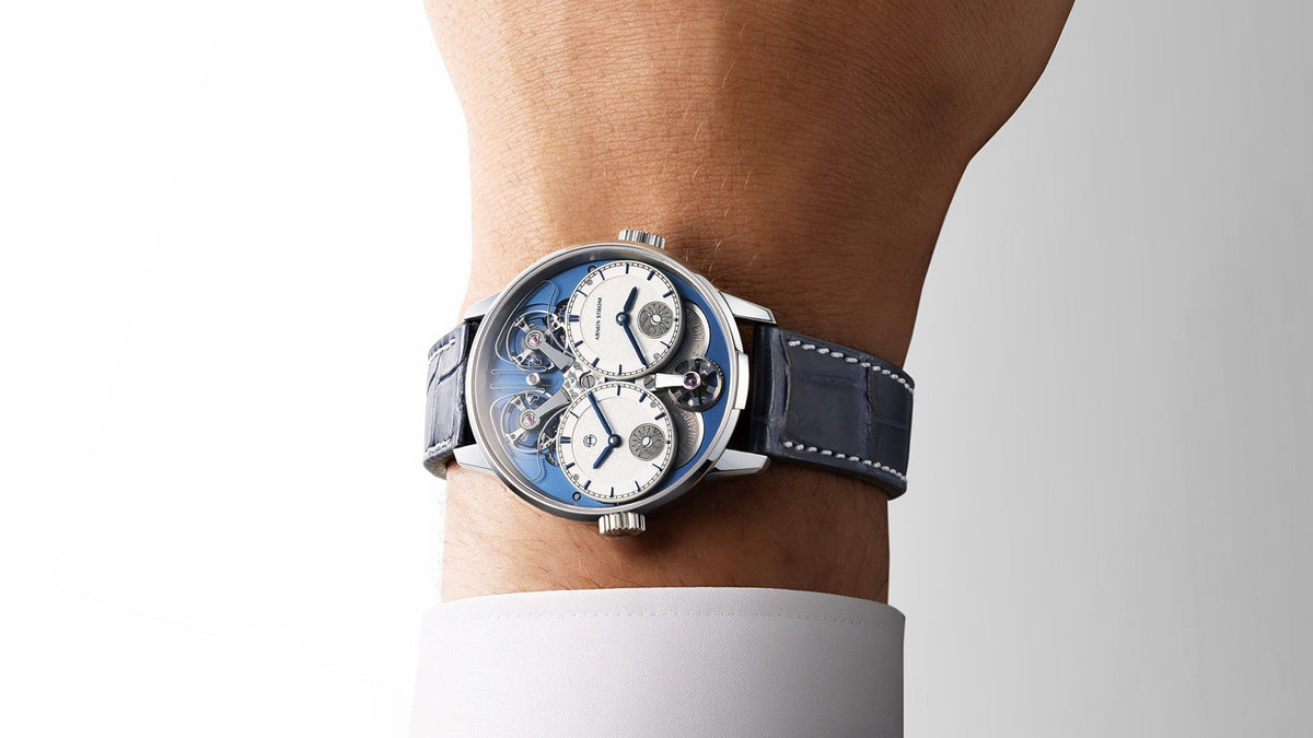 Armin Strom Dual Time GMT Resonance Manufacture Edition Blue worn on the wrist under a white shirt cuff