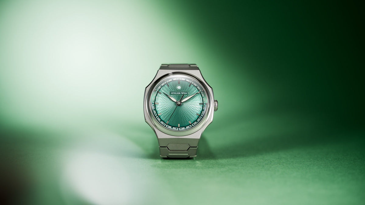Atelier Wen Perception V3 in 筠 Yún bamboo green, standing on an out-of-focus green set