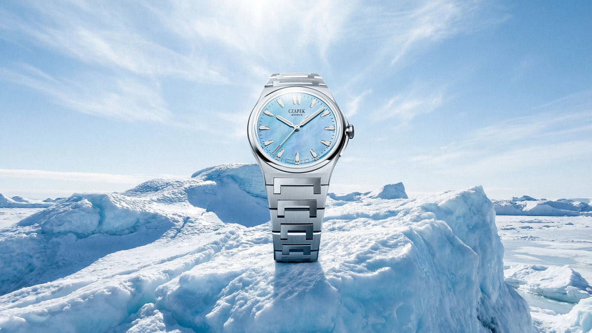 Czapek Antarctique S Ice Cloud standing on an ice block under a bright sky