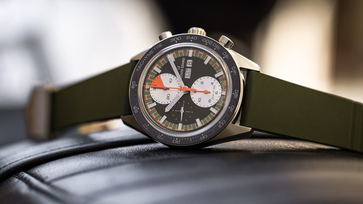 Louis Erard 2300 Chronograph Sport Khaki, resting on a car seat, close angled view