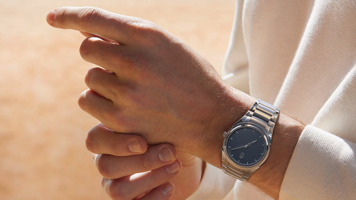 Parmigiani Fleurier Tonda PF 36mm Automatic Stone Blue worn on the wrist at the beach