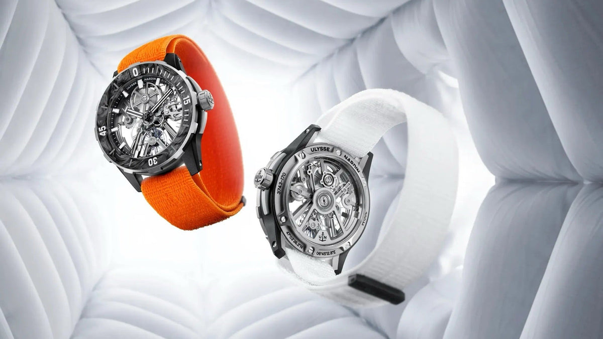 Ulysse Nardin Diver [AIR] and its white-strap twin, floating in a styled studio setting