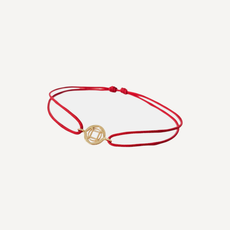 Tiny Om Roots disc bracelet on thread